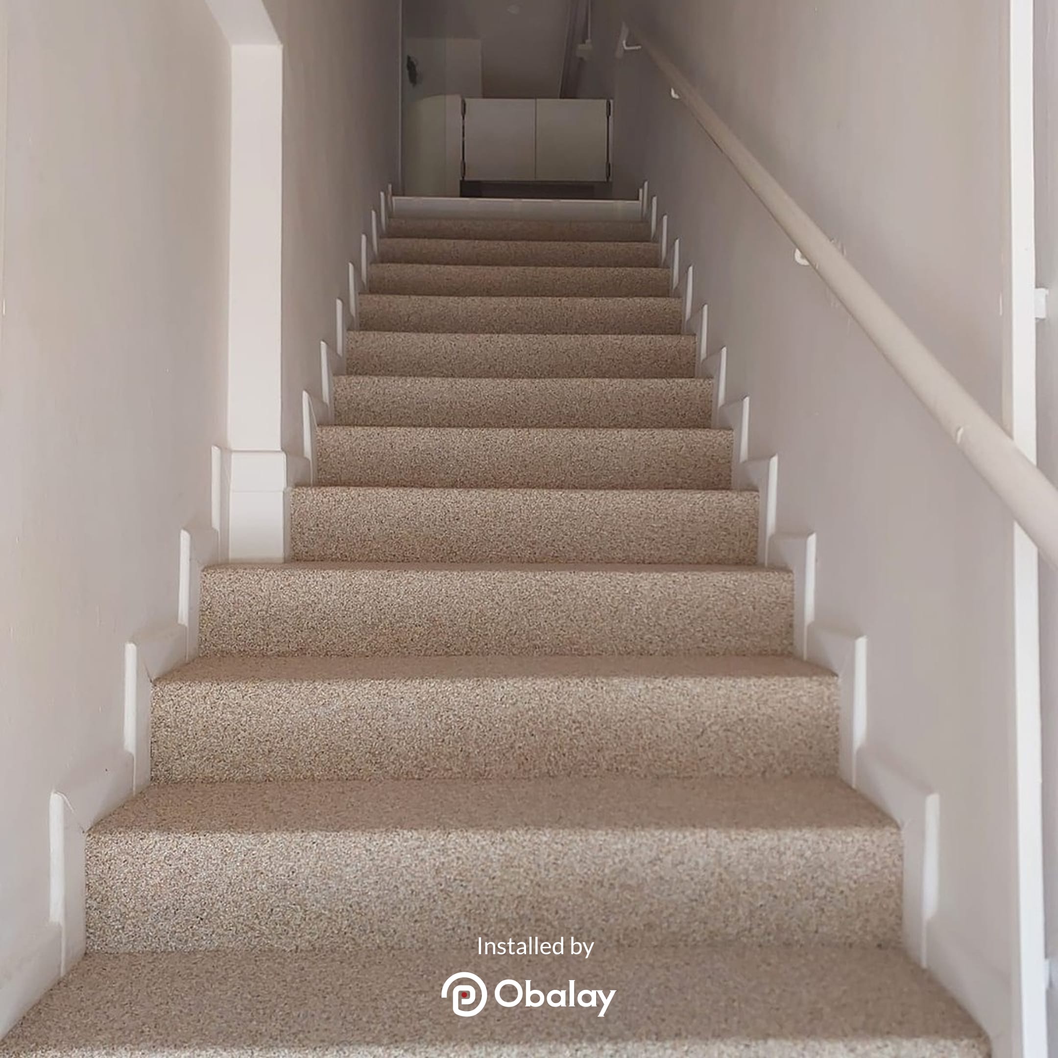 Epoxy Pebble overlay on staircase