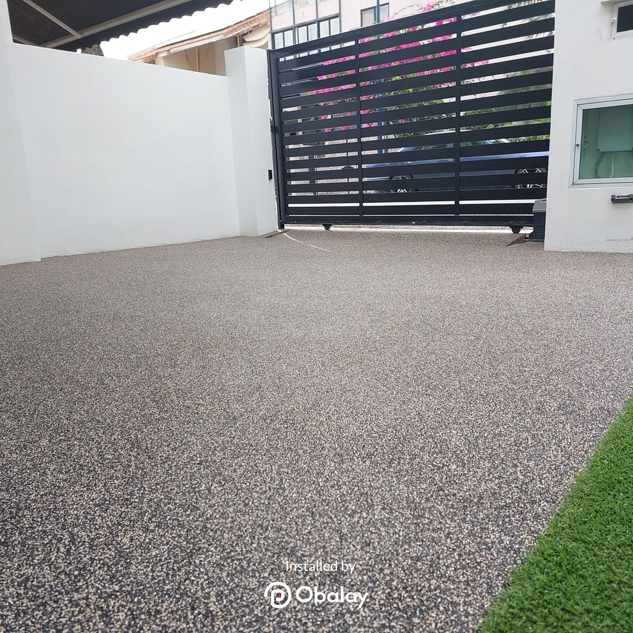 Epoxy Pebble overlay on carporch