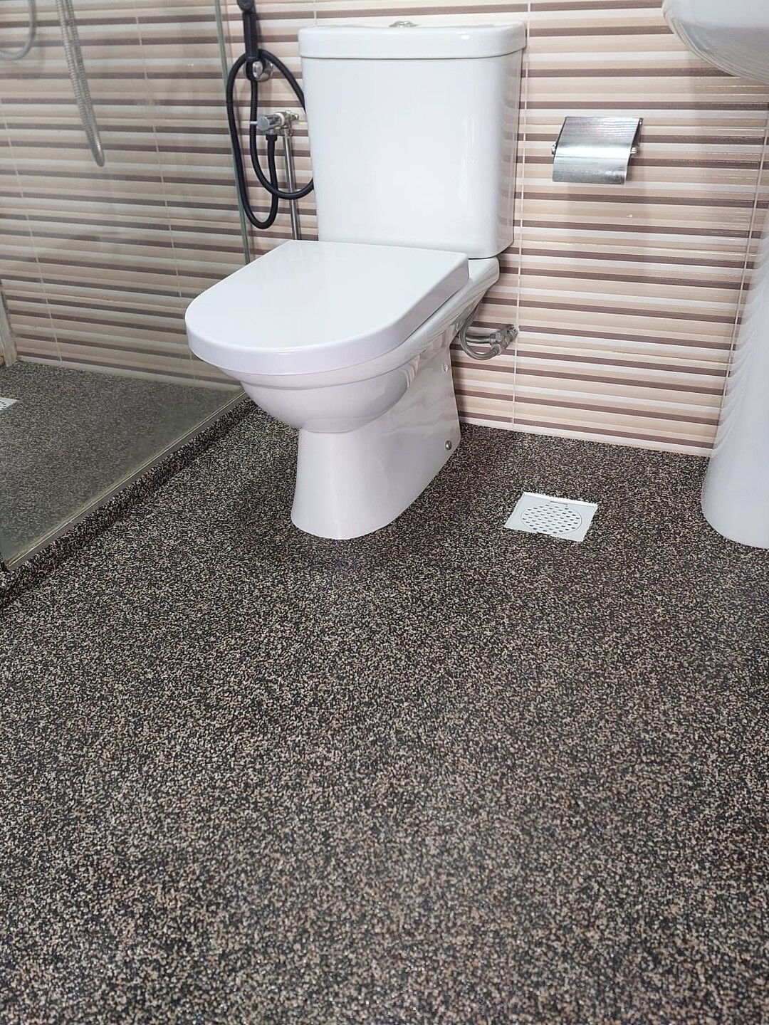 Epoxy Pebble Floor Overlay for bathrooms