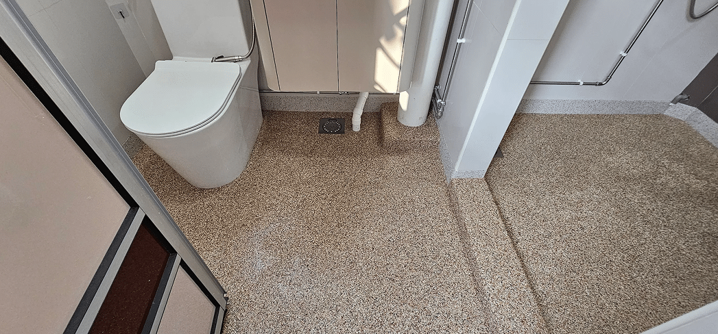 Epoxy Pebble Toilet Floor